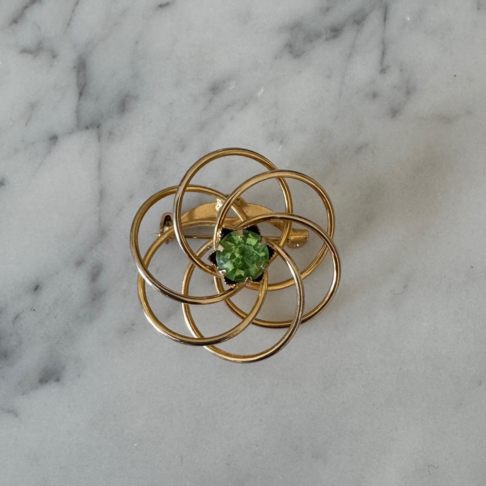 Gold Floral Brooch with Green Stone